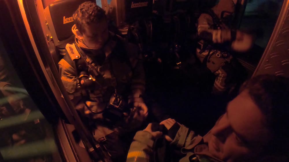 Im Einsatzwagen — Crew in Bewegung